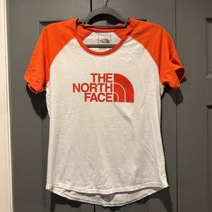 The North Face Women's Orange and White Short Sleeve Tee. Vintage